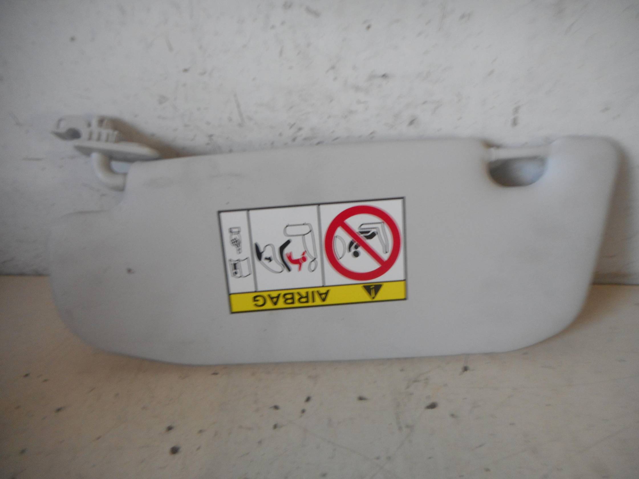 Aletta parasole parabrezza dx.